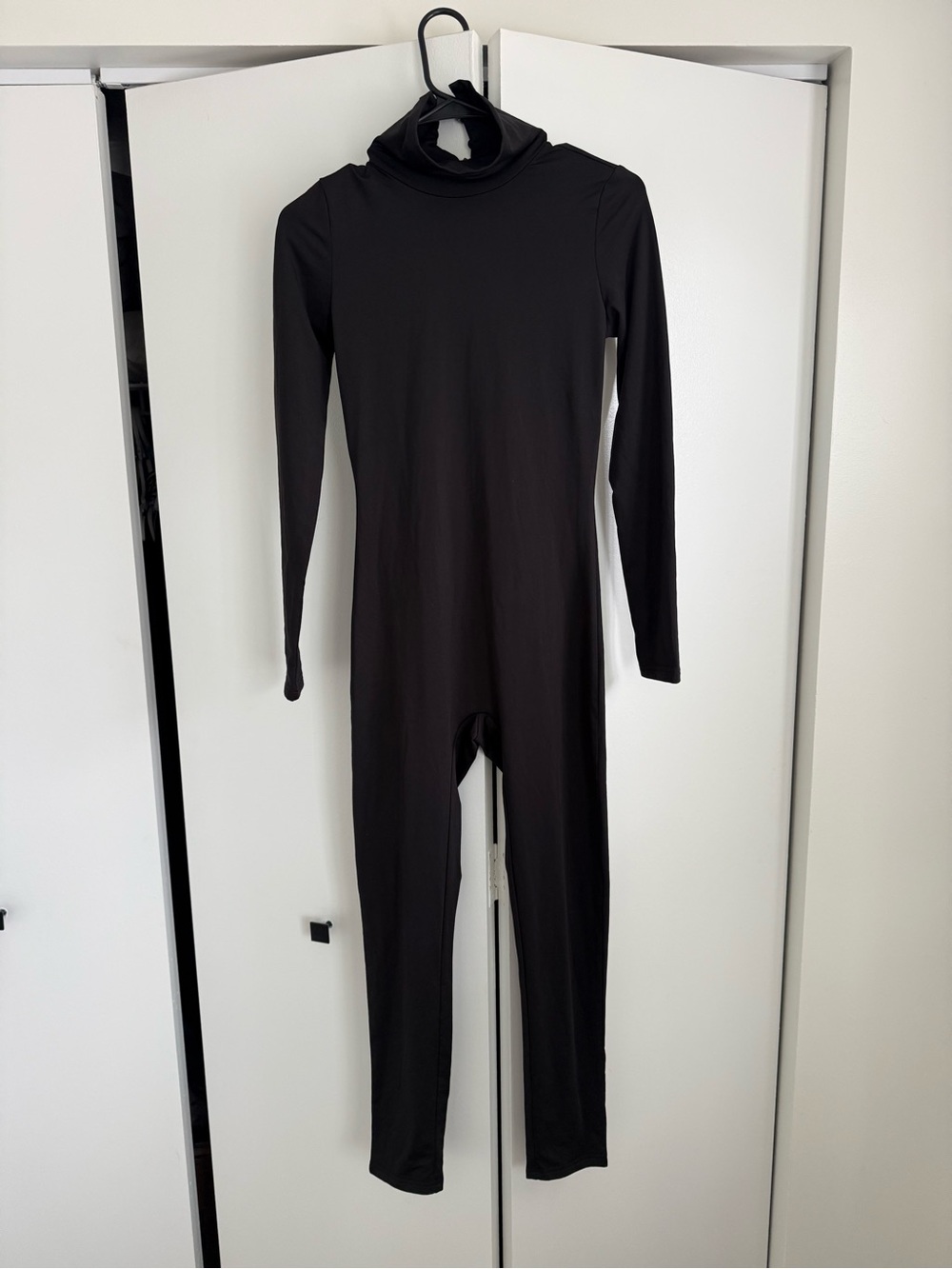 Women's Black Sleek Long-Sleeve Turtleneck Jumpsuit